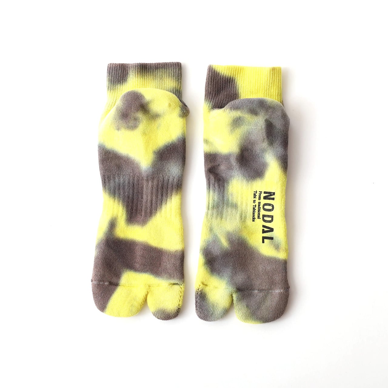 NODAL tie dye yellow and charcoal Tabi sock. Split toe design. Made in Japan with cotton. Unisex fit.